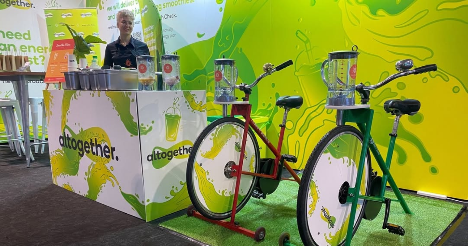 A fully custom branded unique expo stall activity with bike n blend smoothie bikes